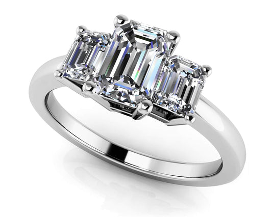 Elegant Three Stone Emerald Engagement Ring