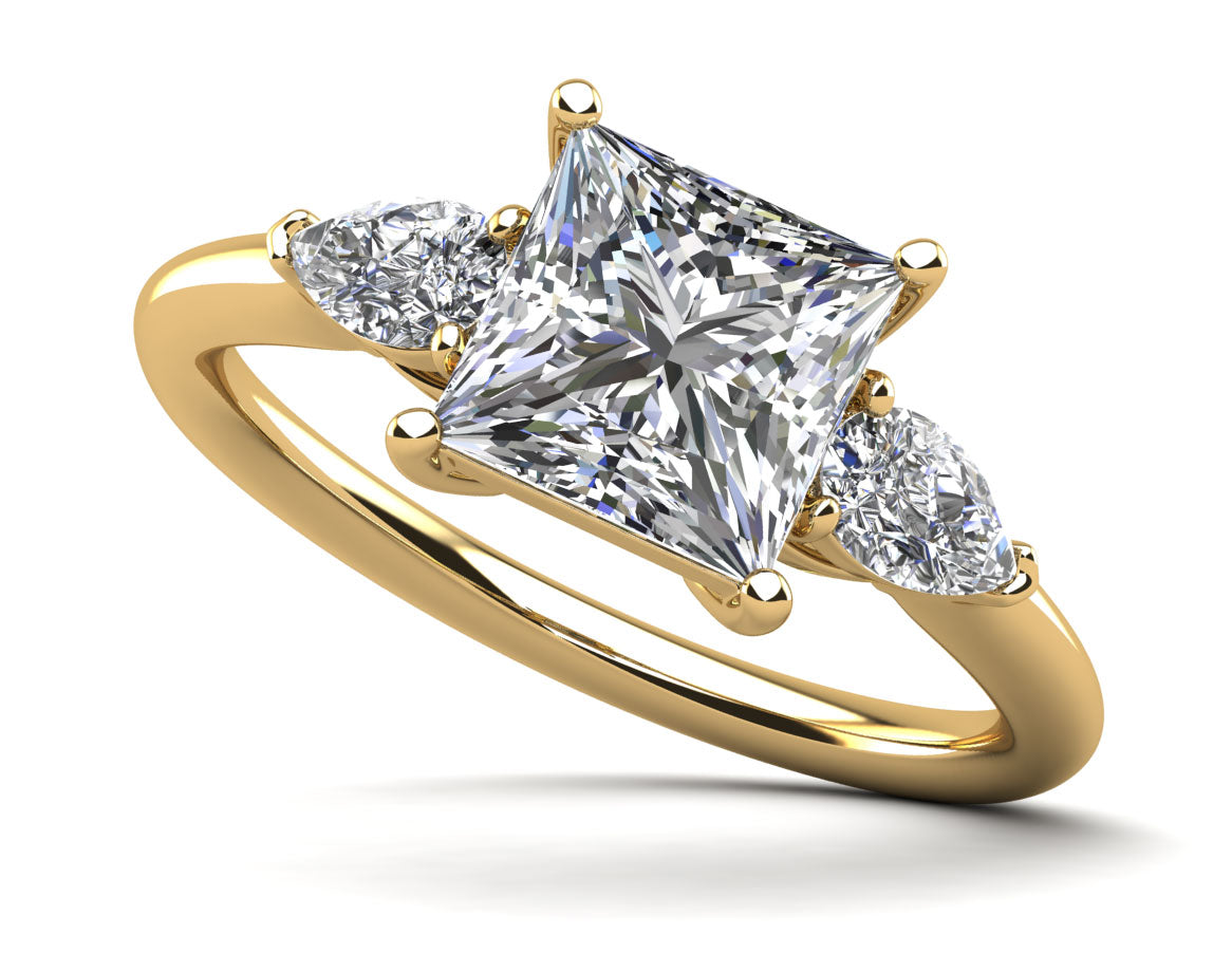 Three Stone Princess And Pear Engagement Ring